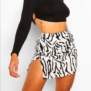 BRAND NEW WITH TAGS. Woven zebra side split skirt